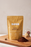 Nova Coffee Superfood package on a wooden board with coffee grounds and a white background